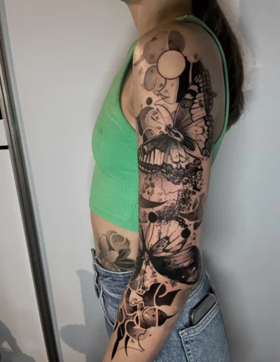 Manica con farfalla, cerchi e fiori - Dario Schiavone, Keyo Tattoo Studio Locarno