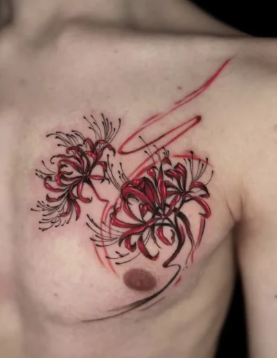 Fiori di licoris rossi sul petto - Marta Gardenia, Keyo Tattoo Studio Locarno